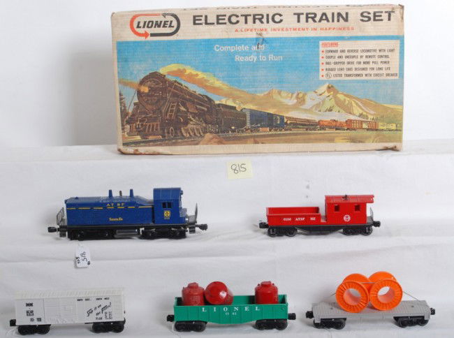 Lionel No. 11530 5 unit diesel freight set in OB,: Postwar Lionel O gauge outfit No. 11530 5 unit diesel freight train in original box with 634 Santa Fe NW-2 diesel switcher, 6014 Frisco boxcar, 6142 canister car, 6402-50 flatcar w/cable reels, and 61