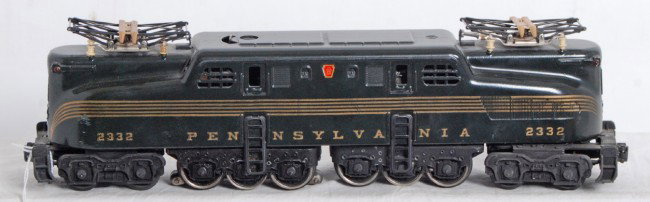 Lionel No. 2332 PRR five stripe GG-1 electric: Postwar Lionel O gauge No. 2332 Pennsylvania green five stripe electric locomotive, C7+ with fantastic looking solid stripes.