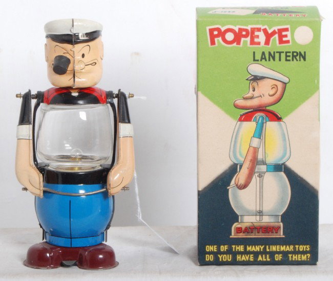 Linemar Toys Popeye lantern in OB: Linemar Toys Popeye lantern in original box. Lantern has clean battery compartment, C7-8. Box has a tape repaired inner flap. Box otherwise looks C8-9.