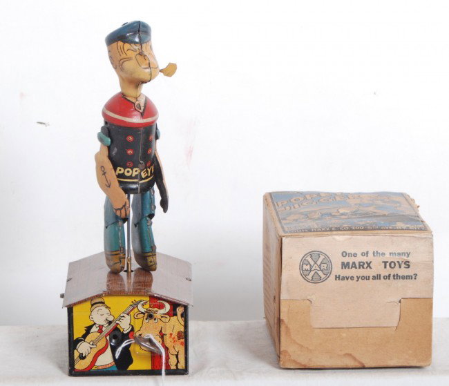 Marx Popeye Jigger windup tin toy in original box: Marx Popeye Jigger windup tin toy in original box, C7. Box has no missing flaps, internal paper tape repairs, restored section. Mechanism winds up and functions properly.