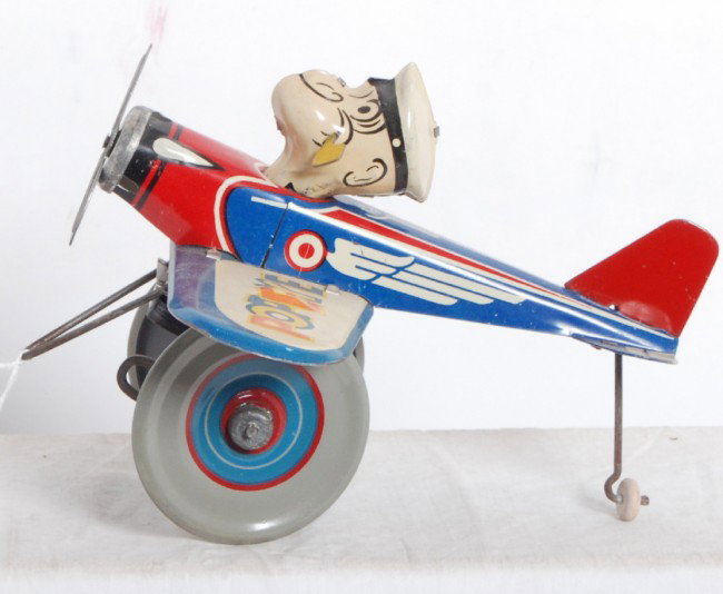 Marx Popeye the Pilot windup tin airplane: Marx Popeye the Pilot windup tin toy. Toy looks great C8.