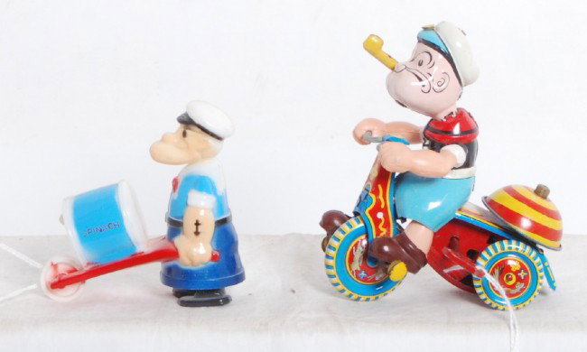 Linemar bell ringing Popeye on tricycle, walk-a-wa: Linemar bell ringing Popeye on tricycle and a Walk-A-Way toy (resembles Marx) without string, marked KFS and made in Hong Kong. Toys look C7-8. Tricycle mechanism winds and functions.