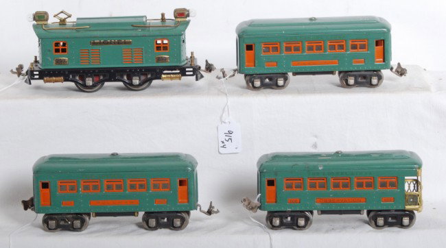 Lionel No. 253, 607, 607, 608 prewar passenger : Prewar Lionel O gauge No. 253 box cab electric locomotive, two No. 607 Pullman coaches, and No. 608 observation car, passenger train. Trains look very clean C6 with casting fatigue to wheels.