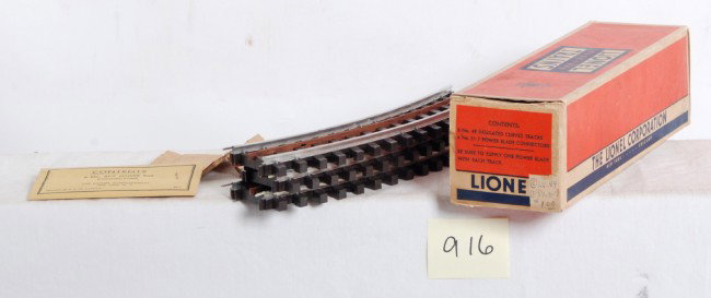 Lionel master carton w/49 Super O insulated track: Postwar Lionel O gauge master carton for No. 49 curved insulated track and 31-7 power bus connectors. Box has small tear to a tuck flap, price sticker, C8 in shape. Three unused sections of track, one