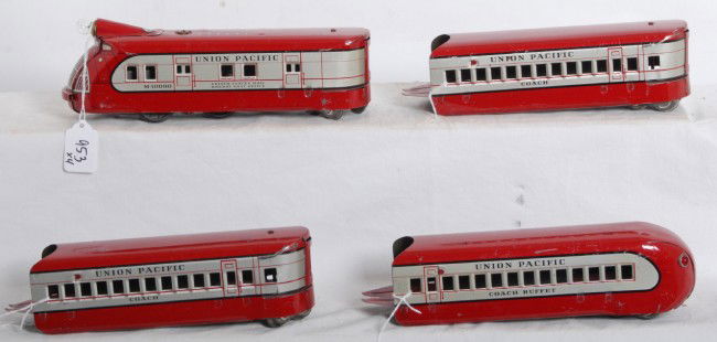 Marx M-10000 Union Pacific four unit diesel passen: Postwar Marx M-10000 Union Pacific four unit diesel articulated passenger train with powered unit, two coaches, and an observation car. Trains look nicer clean and shiny C6++.