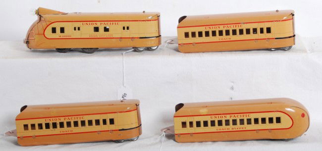 Marx M-10000 Union Pacific four unit diesel passen: Postwar Marx M-10000 Union Pacific four unit diesel articulated passenger train with powered unit, two coaches, and an observation car. Trains look nicer clean and shiny C6+.
