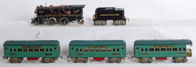 American Flyer prewar O gauge passenger train: Prewar American Flyer narrow/O gauge passenger train with unnumbered 2-4-2 steam loco with bell, 3199 tinplate tender, two Pullman coaches, and an observation car. Trains look nice C6. Loco has had dr