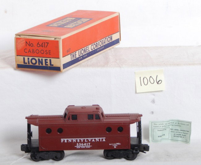 Lionel No. 6417 PRR porthole in OB, Mint: Postwar Lionel O gauge No. 6417 Pennsylvania porthole caboose in original box with inspection slip, unrun C9-10.