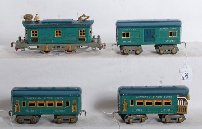 American Flyer 3107, 3150, 6161, 3162 passenger t: Prewar American Flyer O gauge No. 3107 box cab electric loco with 3150 baggage, 3161 Pullman coach, and 3162 observation. Trains look nice C6-7. Loco motor looks to be restored.