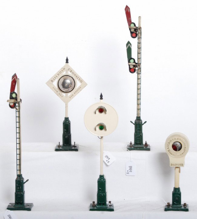 Prewar accessories, semaphores, signals, bells: Prewar toy train accessories. All are unmarked. Three have been repainted and look C6-7. Two original semaphores look C5-6.