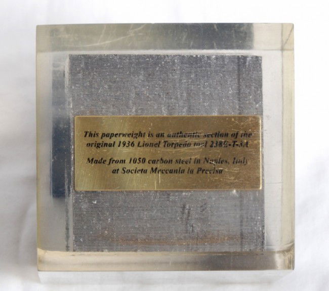 Lionel Paperweight With Original Die from 238E: Lionel paperweight containing an authentic section of the original 1936 Lionel Torpedo tool 238-E-T-3A that was made from 1050 carbon steel in Naples, Italy at Societa Meccania la Precisa