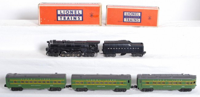 Lionel 671, 2046W PRR, 2400, 2401, 2402 , w/2-OB: Postwar Lionel O gauge No. 671 steam locomotive, 2046W Pennsylvania tender with whistle, 2400 Maplewood Pullman, 2401 Hillside observation, 2402 Chatham Pullman, passenger cars. Trains look very nice 
