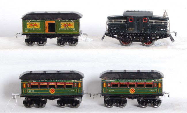 American Flyer 1217, 1105, 1206, 1206 passenger t: Prewar American Flyer O gauge No. 1217 electric loco, 1105 baggage, and two 1206 coaches. Trains look nicer, clean and shiny C6 area. Loco has casting fatigue to wheels.