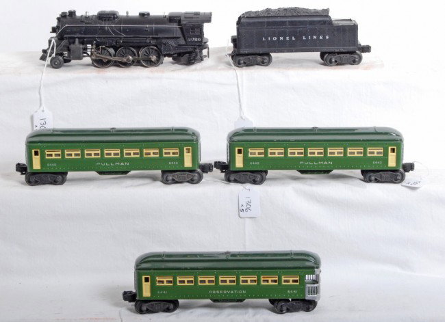 Lionel No. 2026, 2466WX, 6440, 6440, 6441: Postwar Lionel O gauge No. 2026 steam loco, 2466WX tender with whistle, two 6440 Pullman coaches, and a 6441 observation. Trains are very clean and shiny C6-7.