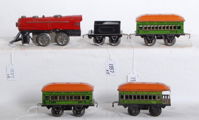 American Flyer The Joy Line steam passenger train: Prewar American Flyer O gauge The Joy Line steam passenger train with mechanical loco, tinplate four wheel tender, two 357 coaches and a 458 observation car.