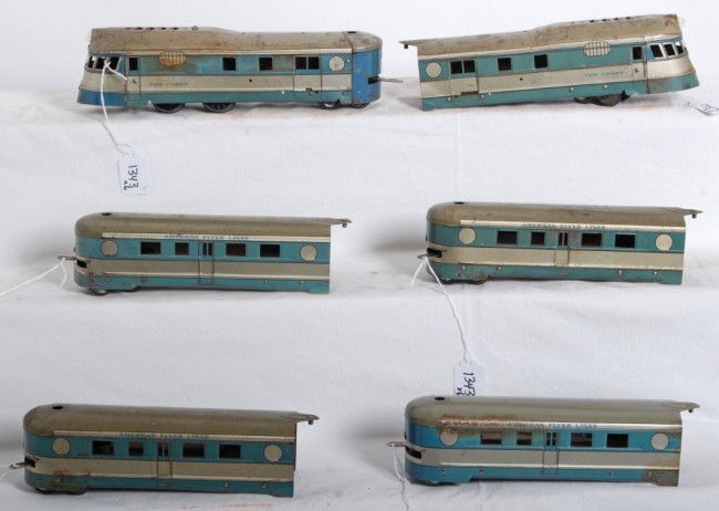 American Flyer 6 unit The Comet streamline articu: Prewar American Flyer O gauge tinplate electrical streamlined articulated diesel passenger train, The Comet. Train is composed of powered unit, four coaches, and a dummy/observation unit. Trains look
