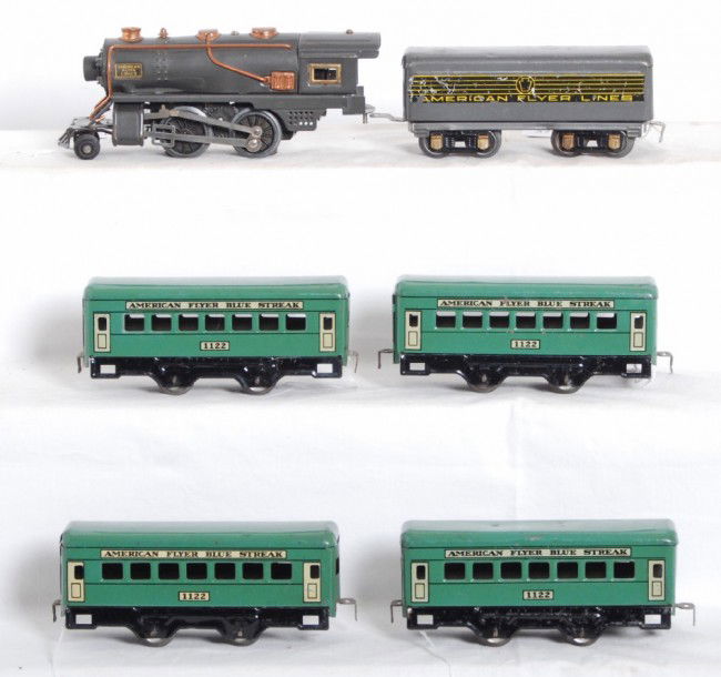 American Flyer steam loco w/four 1122 Blue Streak: Prewar American Flyer O gauge tinplate electric steam locomotive and tinplate tender with four No. 1122 American Flyer Blue Streak passenger coaches. Trains look nice and clean C6.