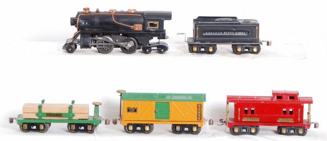 American Flyer 401, tender, three freight cars: Prewar American Flyer No. 401 tinplate steam locomotive and tender with flatcar w/lumber and original load restraints, boxcar, and a caboose. Trains look very clean C6+.