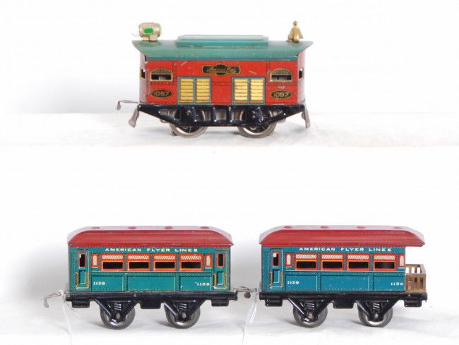 American Flyer 1097 loco and two 1120 passenger c: Prewar American Flyer O gauge boxcab electric locomotive No. 1097 with 1120 coach and a 1120 observation, passenger cars. Loco is C6, cars are nicer C6-7 area.