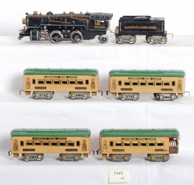 American Flyer loco, 3199 tender, 3171 x3, 3172: Prewar American Flyer diecast steam locomotive, 3199 tinplate tender, three 3171 Pullman coaches, and a 3172 observation car. Trains are C6.
