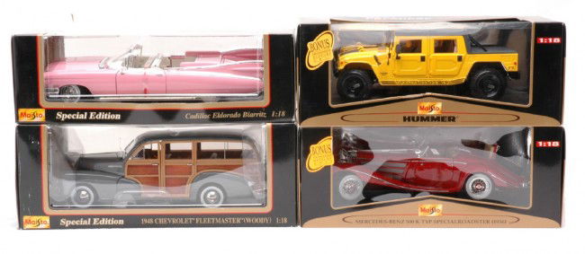 Maisto Die Cast 1:18 Scale Cars MINT Boxed: Maisto die cast 1:18 scale cars including; Mercedes-Benz 500 K Typ Special Roadster 1936, Cadillac Eldorado Biarritz 1959, Hummer soft top and a 1948 Chevrolet Fleetmaster Woody all factory new in OBs