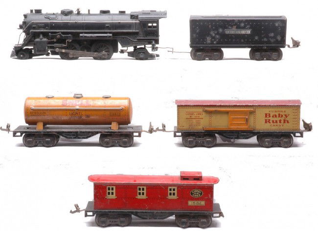 Lionel Prewar 1664 1689W Litho 1679 1680 1682: Lionel prewar O gauge 1664 black 2-4-2 steam loco, 1689W tender and three lithographed freight cars including; 1679 yellow Baby Ruth boxcar with maroon roof, 1680 orange Shell tank and a 1682 red cabo