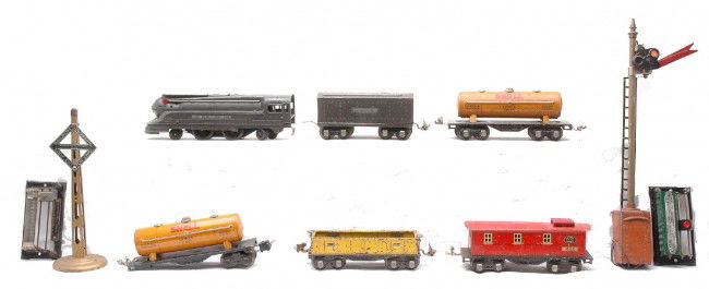 Lionel 1688E 1689T 652 88 95 80 2680 1680 1682: Lionel prewar O gauge 1688E gun metal 2-4-2 steam loco, 1689T tender, 652 yellow gondola, no. 88 battery rheostat, no. 95 controlling rheostat, 80 semaphore and lithographed freight cars including; 26