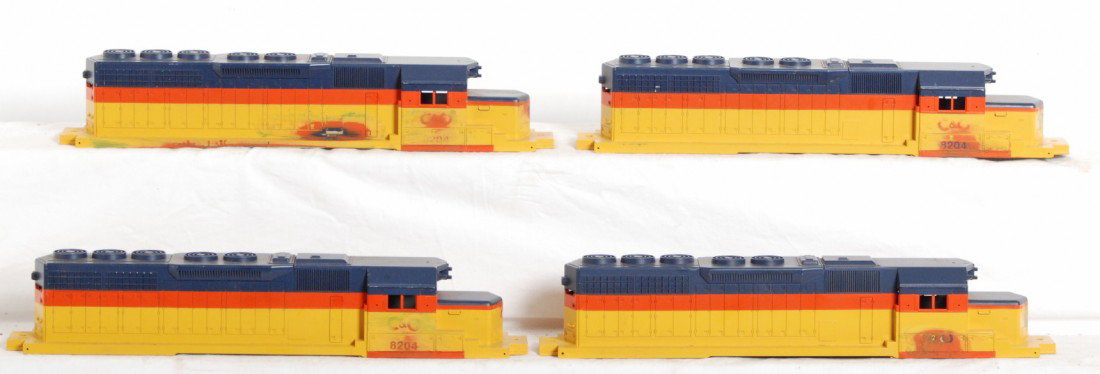 4 Lionel Chessie SD40 factory error shells: Lionel modern O Gauge 8204 Chessie SD40 shells. Four shells are all factory painting errors with streaks, over spray, runs, and other items that would have kept these shells from being useable. See ph