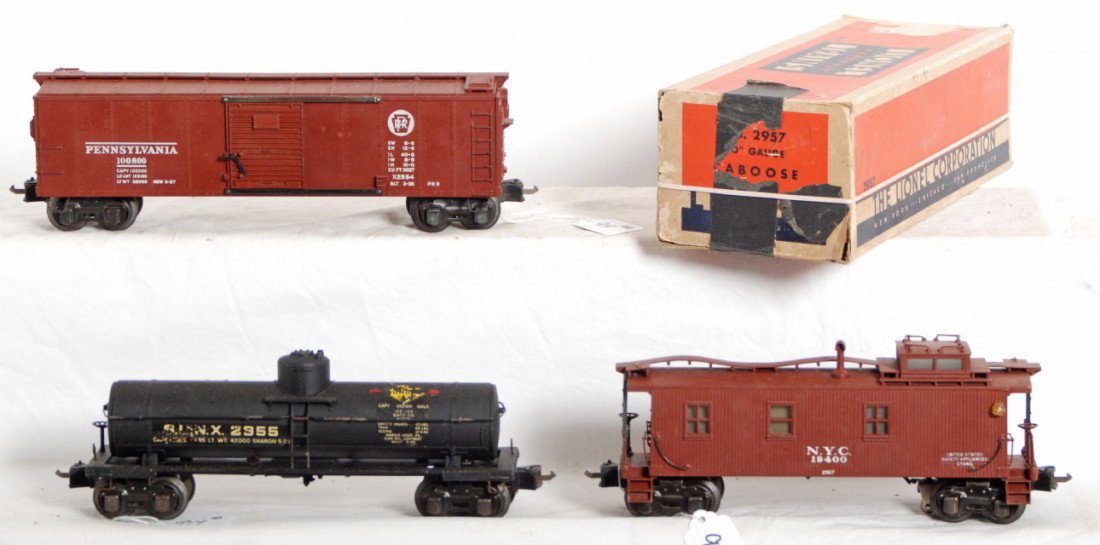 Lionel No. X2954, No. 2955, 2957 semi scale: Prewar Lionel O gauge semi scale freight cars and one original box with insert. X2954 Pennsylvania boxcar, 2955 Sunoco tank car, and 2957 New York Central caboose. Tank car has fine frame casting, one