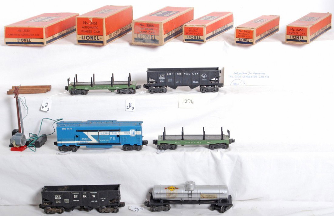 Lionel 3530, 6456, 3461X-25, 3461-25, 2555, 3456: Postwar Lionel O gauge No. 3530 operating generator car, 6456 LV hopper, 3461X-25 automatic lumber car, 3461-25 automatic lumber car, 2555 Sunoco tank, and 3456 Norfolk and Western operating hopper, i