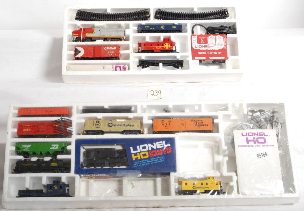 Two Lionel HO gauge diesel freight sets in OB: Two modern era Lionel HO gauge diesel freight sets in original boxes, one is missing track and transformer. 1480 has torn cello, but not enough for any of the trains to have been removed, no track or