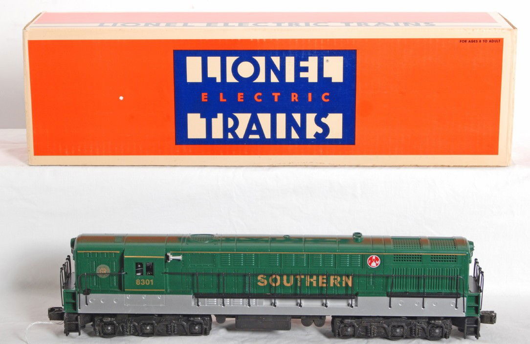 Lionel Southern 18301 FM Trainmaster: Lionel modern O Gauge Southern FM Trainmaster in OB. Loco is C8 condition with some light run time and a few light scuffs on the underside of the frame. OB has some shelf wear and a number written on