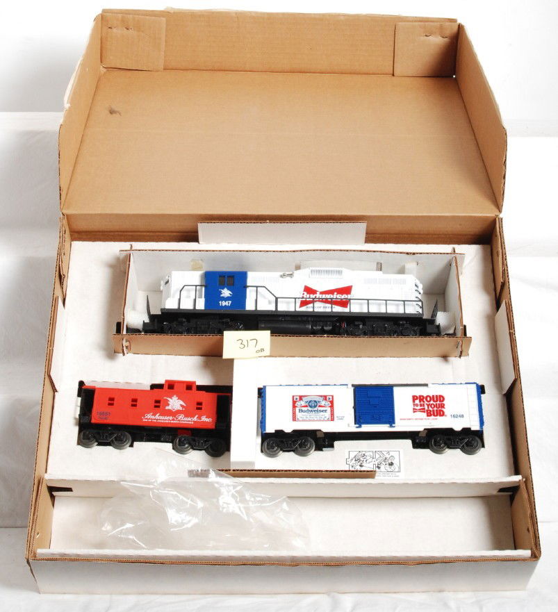 Lionel 11810 Anheuser Busch set: Lionel modern O Gauge 11810 Anheuser Busch set in OB. Set is missing track and transformer otherwise C8 with some run time. Set box shows light wear.