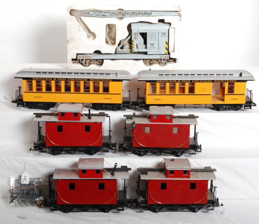 Lot of LGB Denver and Rio Grande freight and pass.: Modern era lot of LGB G scale freight and passenger cars. 3080 and 3081 passenger cars and four bobber cabooses that have been repainted. Also included is a Charles Ro D&RGW Rio Grande OW derrick/cran