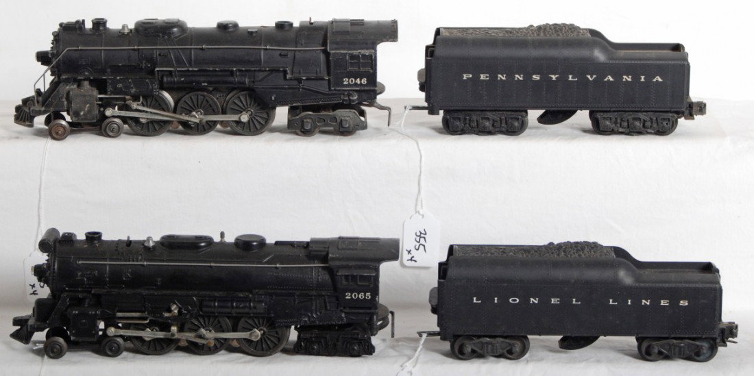 Lionel 2046 and 2065 steam locos, 2671W and unnumb: Postwar Lionel O gauge 2046 and 2065 steam locos, 2671W and an unnumbered, whistle tenders. 2671W tender has chipped shell. Trains should clean and polish to look very nice C6 area.