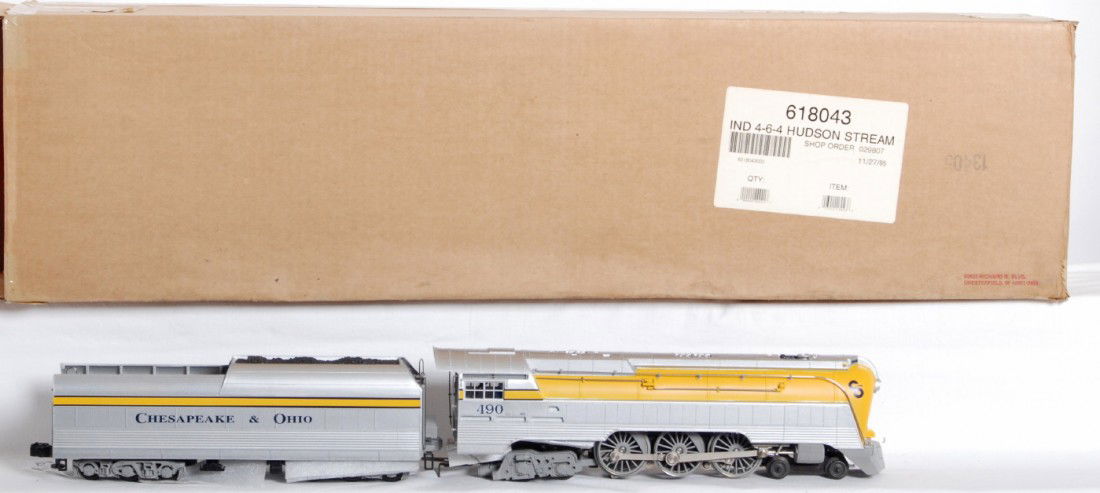 Lionel 18043 C&O yellow belly Hudson with TMCC: Lionel modern O Gauge 18043 Yellow Belly Hudson in OB. Loco features smoke, TMCC, and Rail sounds. Loco looks C9-10 with no running beyond a factory test. Cab roof does have one very small scuff which