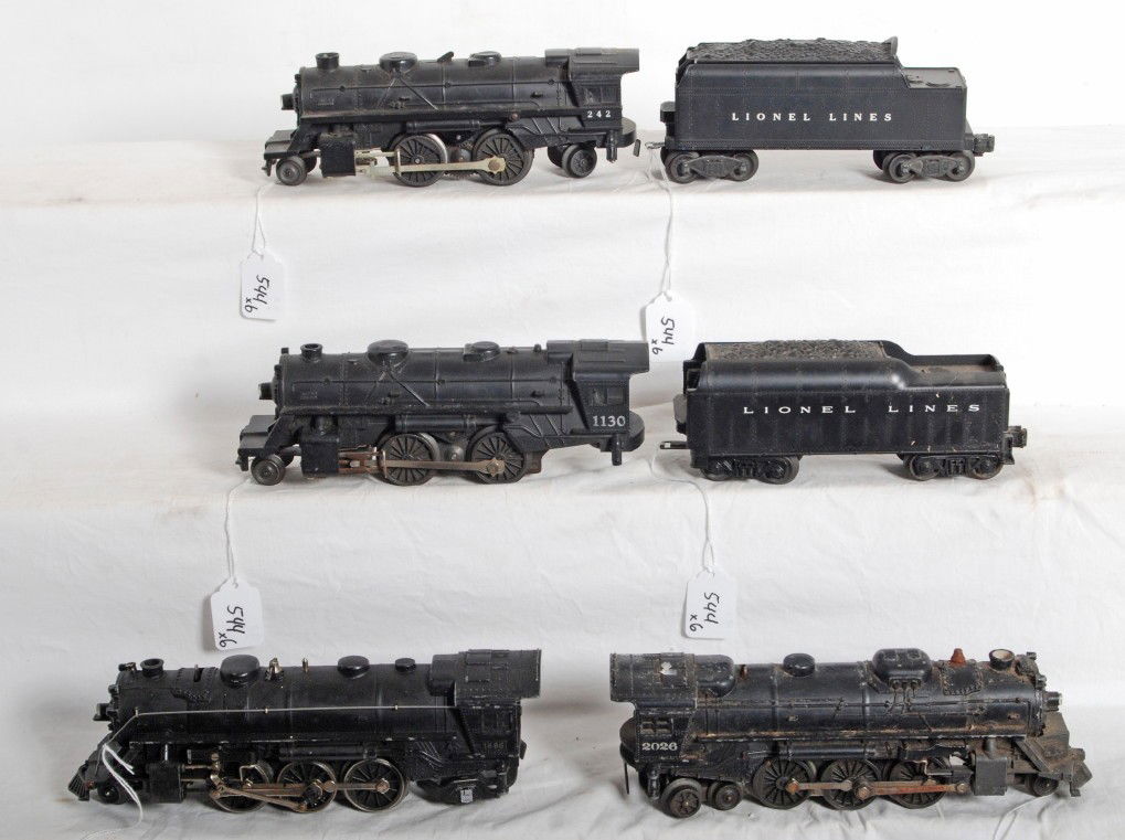 Lionel steam locos and tenders, 2026, 1666, 1130..: Postwar Lionel O gauge steam locomotives and tenders without whistles. 2026, 1666, 1130, and 242 steam locomotives, 6466W tender and an unnumbered tender. Trains should clean to look C5-6. 242 is miss