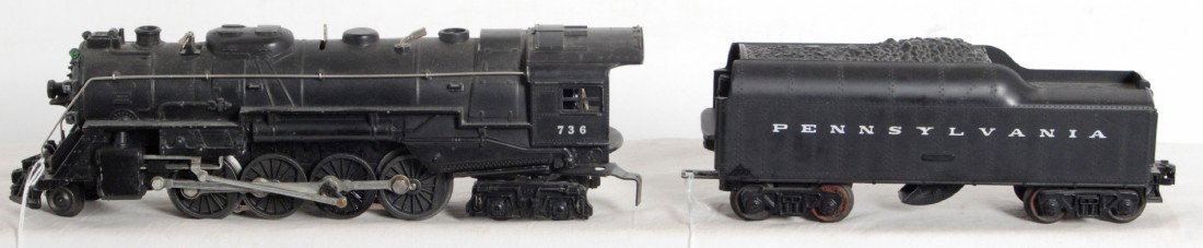 Lionel No. 736 steam loco and Pennsylvania tender: Postwar Lionel O gauge No. 736 steam locomotive and an unnumbered Pennsylvania whistle tender. Train is nice clean C7 area. Tender has rust on frame and shell has tight hairline at both screws. Tender