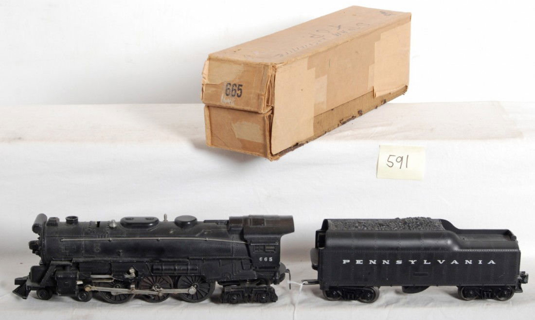 Lionel 665 loco in OB with Pennsylvania whistle te: Postwar Lionel O gauge No. 665 steam locomotive in original box with an unnumbered Pennsylvania whistle tender. Loco looks better C6 and tender shell looks C6+. Tender frame looks repainted. Loco box