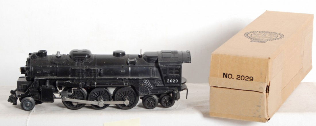 Lionel No. 2029 steam locomotive in OB: Postwar Lionel O gauge No. 2029 steam locomotive in original box. Loco looks C6+. Box looks C8+ area.