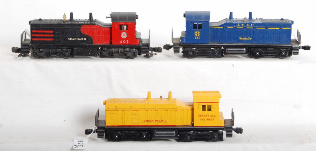 Lionel 602, 634, and 635 NW-2 diesel switchers: Postwar Lionel O gauge 602 Seaboard, 634 Santa Fe, and 635 Union Pacific, NW-2 diesel switchers, all have super tight hairlines at screw. Trains should clean to look C6-7.