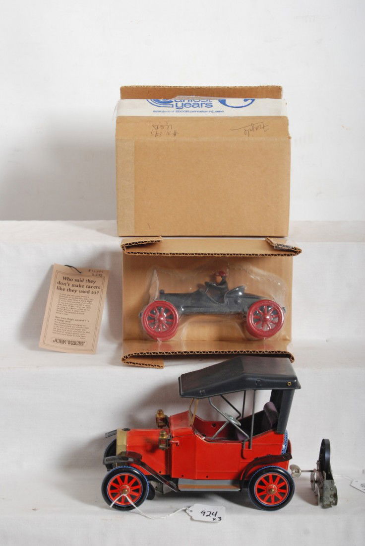 Battery operated tinplate, cast iron, windup motor: Battery operated tinplate early automobile with marking on dash, cast iron John Wright toy car, windup motor with paper label. Please view the photographs for the best description and as to the condit