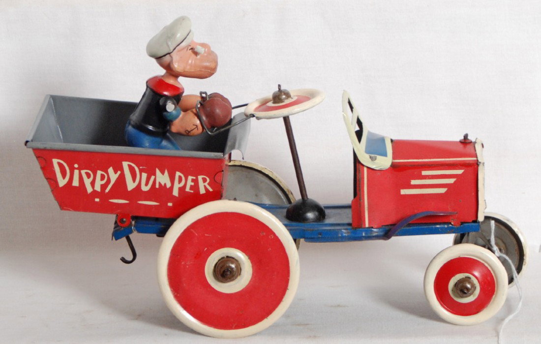 Marx Popeye Dippy Dumper tin windup toy: Marx Popeye Dippy Dumper tin windup toy. Toy has repainted inside of bed/gray area, with functioning mechanism. Toy otherwise looks C7 area.