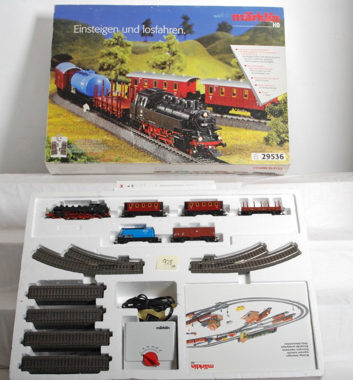 Marklin HO 25936 train set: Marklin modern HO train set in OB. Catalog number is 29536. Includes DB class 86 tank steam locomotive two passenger cars, stake car, tank car, and boxcar. Also includes track and transformer. Set app