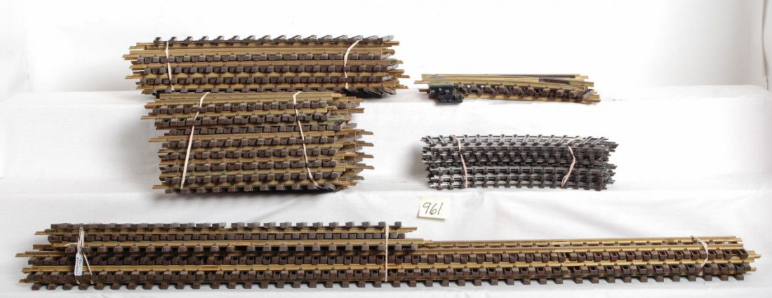 56 sections LGB track and extras: LGB modern G Scale track. Includes five sections of 4ft straight, four sections of 2ft straight, seventeen sections of No. 1600 curves, fifteen sections No.1100 curves, fifteen sections No. 1000 strai