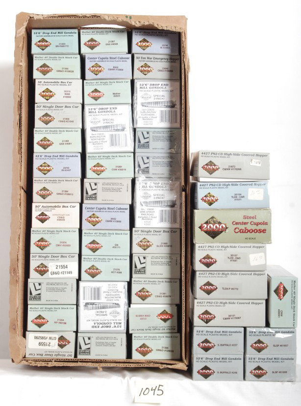 50 HO Proto 2000 NOS freight cars: Life Like Proto 2000 modern HO freight cars in OBs. Fifty cars include boxcars, hoppers, cabooses, etc. Cars are all C9-10 and NOS. See photos for best description.