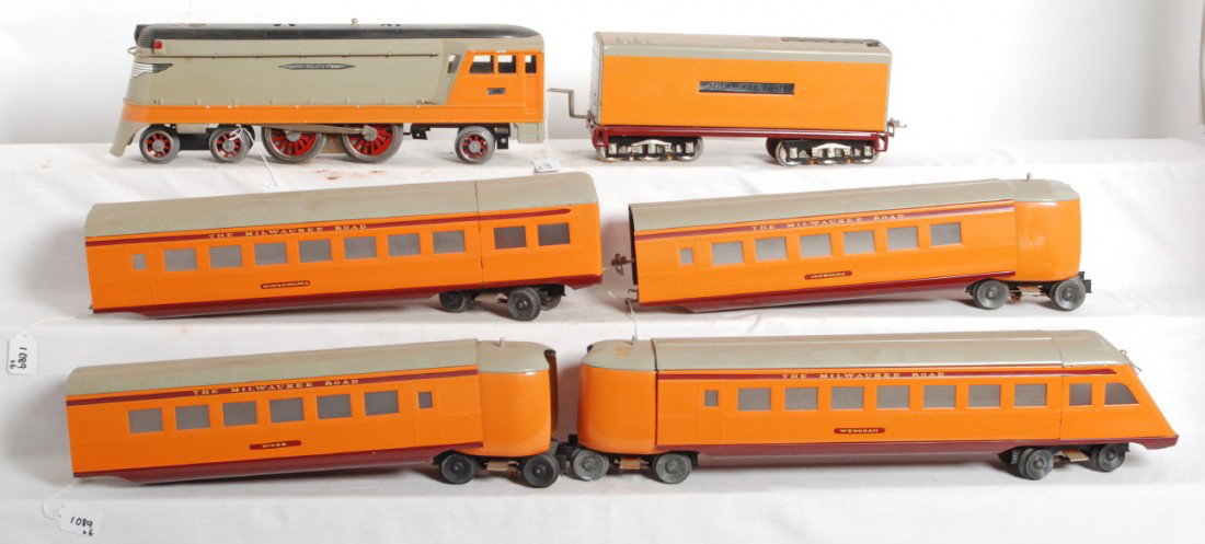 JAD Lines/McCoy Milwaukee Road Hiawatha S.G.: JAD Lines standard gauge Milwaukee Road Hiawatha steam streamline articulated passenger train. Steam loco with McCoy motor, tender, diner, Minnewawa coach, Ishkooda coach, Wenonah observation. Some li