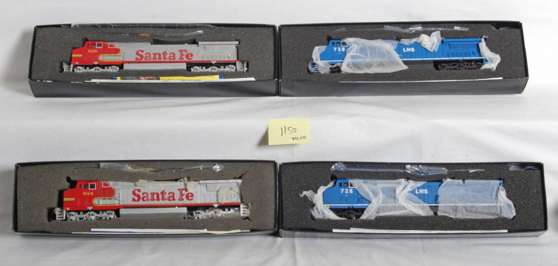 4 Bachmann Spectrum Santa Fe and LMS Dash 8 locos: Bachmann Spectrum modern HO diesel locomotives in OBs. Four Santa Fe and LMS Dash 8 locomotives include two 80630, 86006, and 86021. Locos are NOS and appear C9-10. OBs show some corner and edge wear.