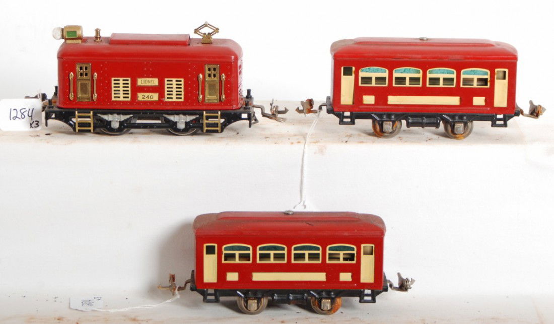 Lionel 248 loco, two 4 wheel passenger cars: Prewar Lionel, restored O gauge 248 boxcab electric locomotive with two 4 wheel passenger cars. Loco may have been rewheeled, cars have no lettering, some surface rust on couplers, wheels, trim, etc.
