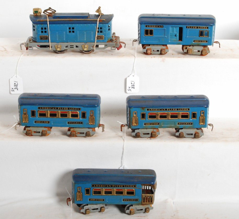 American Flyer 3105 elec. loco, four 8 wheel pass: Prewar American Flyer, restored O gauge electric locomotive No. 3105 and four 8 wheel passenger cars. Trains have been restored/partially restored with some surface rust on some wheels, couplers, trim
